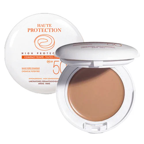 Tinted SPF 50 compact face powder, open case with beige makeup product