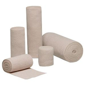 Assorted medical gauze bandage rolls for wound care on a white background