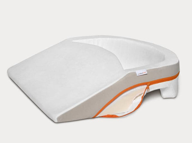 White wedge pillow cover with orange zipper for medical support cushion
