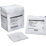 Sterile 4-ply gauze sponges in open box, sealed package, and single pads for wound care