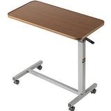 Adjustable overbed table with wheels and wood finish for home medical use