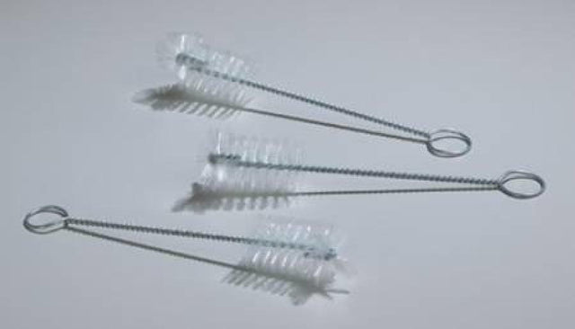 Three small wire cleaning brushes with clear bristles on a white background