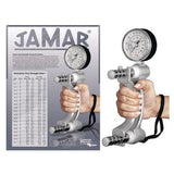 Hand holding a Jamar hydraulic hand dynamometer with grip strength gauge and reference chart