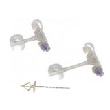 Two transparent gastrostomy tube attachments and a medical tube for enteral feeding