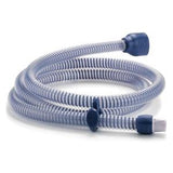 Flexible CPAP machine tubing hose for sleep apnea therapy, shown coiled on a white background