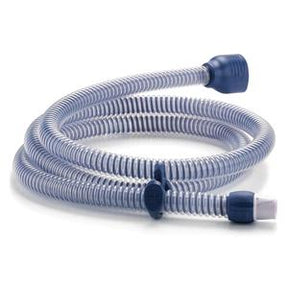 Flexible CPAP machine tubing hose for sleep apnea therapy, shown coiled on a white background