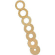 Stack of round beige medical adhesive rings for ostomy care supplies