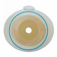 Round ostomy barrier with adhesive ring for medical stoma care