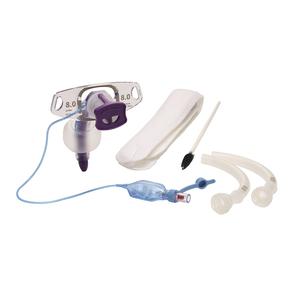 tracheostomy care kit with tube, cleaning brush, ties, and suction accessories