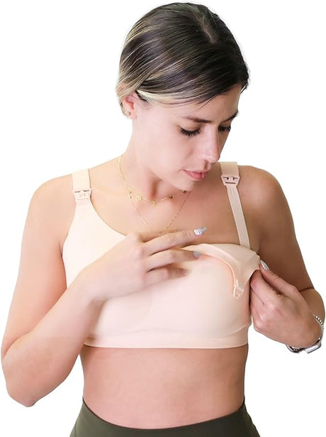Woman wearing a beige medical bra with front opening and adjustable straps