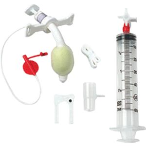 Tracheostomy care kit with syringe, trach tube, inflation bulb, and medical accessories