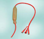 Silicone three-way Foley catheter with inflation balloon on light background