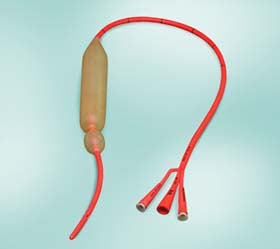 Silicone three-way Foley catheter with inflation balloon on light background