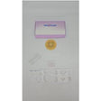 Ostomy care kit with stoma barrier, measuring guide, and accessories on white background