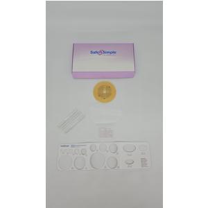 Ostomy care kit with stoma barrier, measuring guide, and accessories on white background