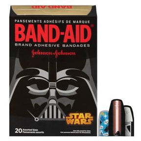 Star Wars themed BAND-AID adhesive bandages box featuring Darth Vader design, assorted sizes visible.