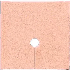 Square beige ostomy barrier with central hole and slit, medical supply for stoma care
