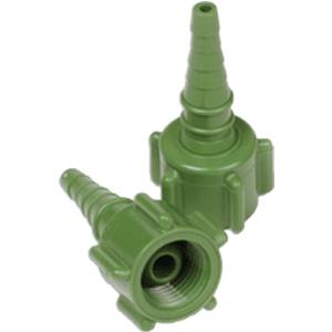 Green medical tubing connectors for home healthcare equipment, close-up view