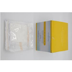 Sterile medical supplies in clear packaging next to a yellow and white box on white background