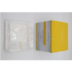 Sterile medical supplies in clear packaging next to a yellow and white box on white background