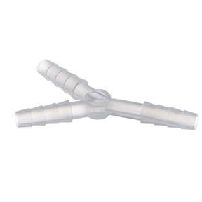 Clear plastic three-way medical tubing connector on white background