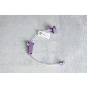 Purple extension set for medical infusion, IV connector on gray background