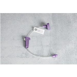 Purple extension set for medical infusion, IV connector on gray background