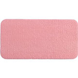 Rectangular pink medical foam dressing pad with textured surface, isolated on white background