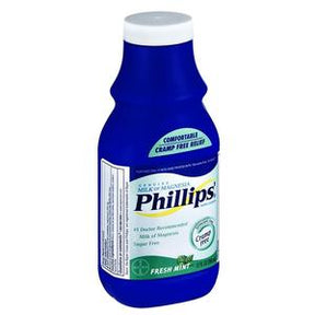 Blue bottle of Phillips milk of magnesia for digestive health with label and fresh mint flavor.