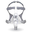 Full face CPAP mask with clear cushion, grey headgear, and adjustable straps