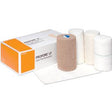 Medical bandage rolls and gauze pads set next to packaging box on white background.