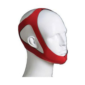 Red adjustable chin strap for sleep apnea therapy on mannequin head