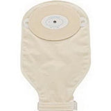 Beige ostomy drainage pouch with adhesive barrier for medical use