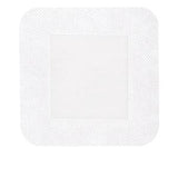 Sterile adhesive medical dressing pad with white absorbent center on white background