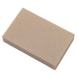Rectangular beige medical foam dressing on white background