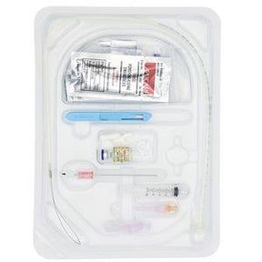 Sterile medical catheter kit with syringe, tube, scalpel, and packaged accessories in plastic tray