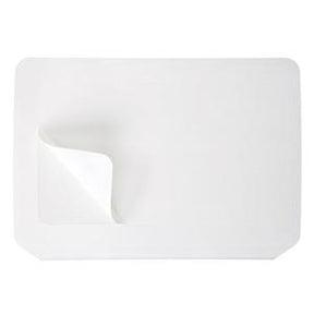 Rectangular white adhesive medical patch with a peeled corner on a plain background