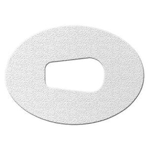 Oval white adhesive medical dressing with center cutout for ostomy or wound care