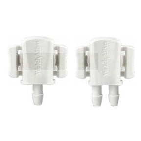 Pair of white medical tube connectors for home healthcare equipment
