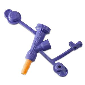 Purple medical tube connector with orange cap for enteral feeding