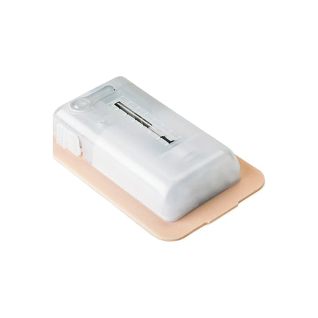 Medical infusion set with transparent plastic housing and adhesive pad for home care