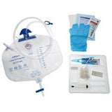 Urinary catheter kit with drainage bag, medical gloves, wipes, and sterile supplies