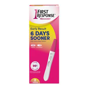 First Response Early Result at-home pregnancy test box with test stick on pink background