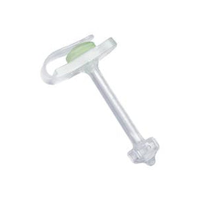 Clear medical gastrostomy tube with green cap on white background