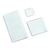 Three sterile white wound dressing pads in different sizes on a plain background