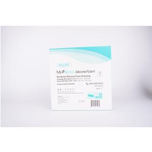 Box of bordered silicone foam medical dressing on white background, wound care supply