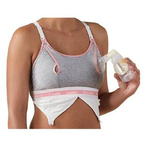 Woman using hands-free breast pump with gray and pink maternity bra for nursing mothers