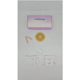 Ostomy care supplies kit with wafer, barrier strips, and Safe n Simple box on white background