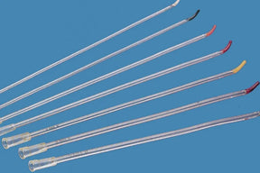 Assorted medical catheters with bent tips and color-coded ends on blue background