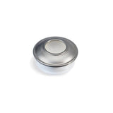 Round metallic medical container with a flat lid on a white background